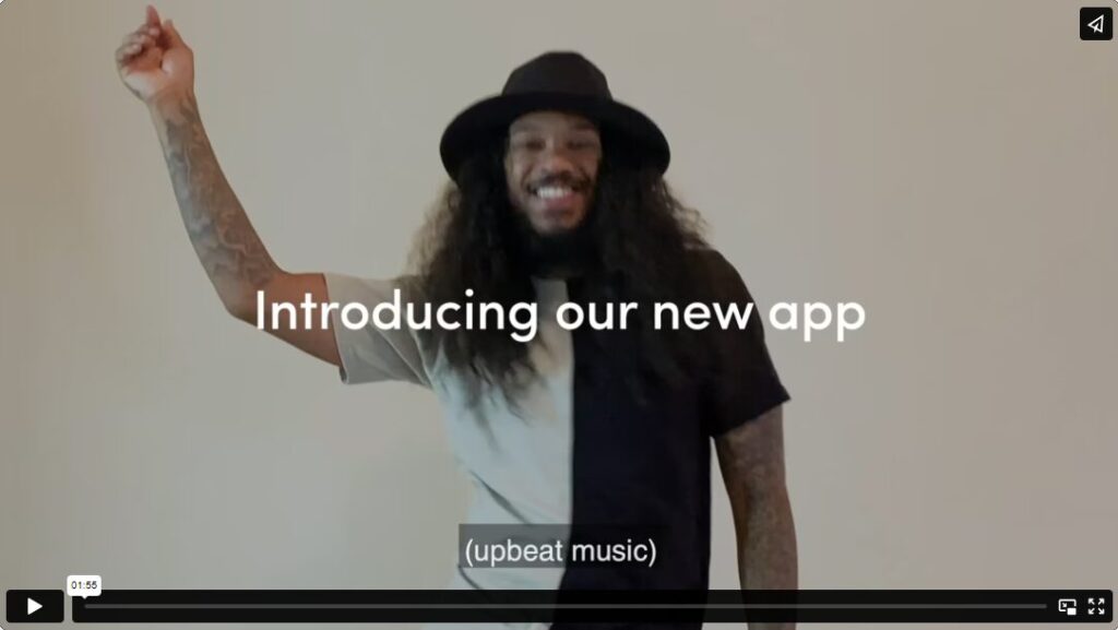 Thumbnail shows an image of a Black man with long curly hair and a black hat, wearing a white and black tee, smiling with his arm up. White text over the image reads “Introducing our new app”.